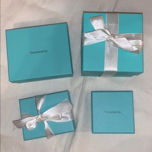 Irregular size Tiffany & Co. boxes (4) with bags
